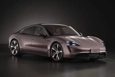Sleek Frozenberry Porsche Taycan Electric Luxury Sports Sedan Studio Shot image