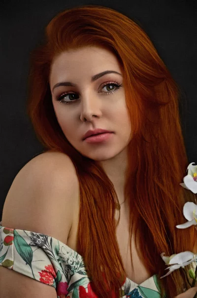 Captivating Red-Haired Woman in Floral Off-Shoulder Dress with Orchids image