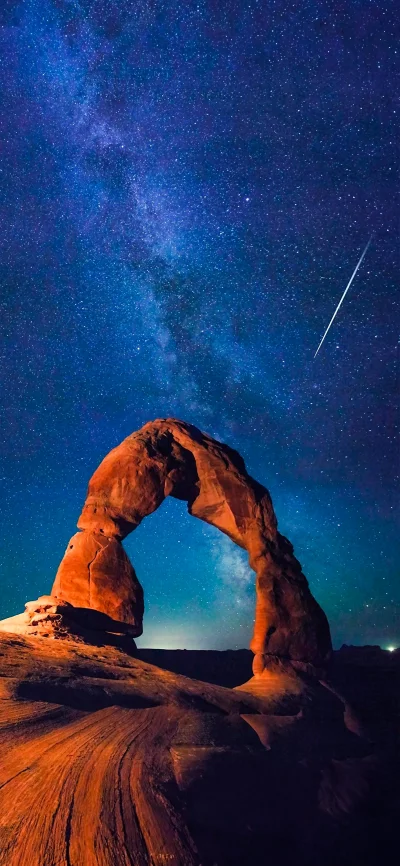 Delicate Arch Under Milky Way with Meteor Shower