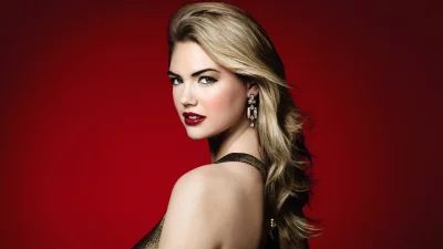 Blonde Woman Posing Elegantly in Gold Dress on Red Background image