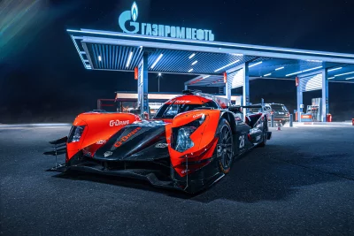 Red Racing Car G-Drive Parked at Gazprom Gas Station Night Cinematic Wallpaper Style image