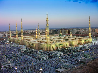 Al-Masjid an-Nabawi Grand Mosque in Medina during Twilight Prayer with Thousands of Pilgrims image