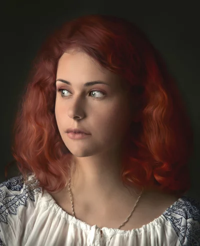 Pensive Red-Haired Woman in White Blouse with Patterned Sleeves Looking right side image