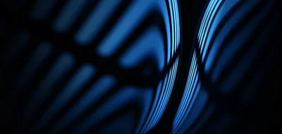 Abstract Blue Glowing Lines on Dark Background: Modern Digital Wave Design image