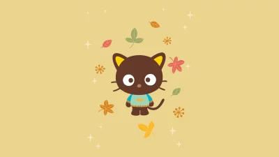 Charming Brown Cartoon Cat Character with Autumn Leaves and Sparkling Accents image