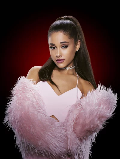 Ariana Grande Posing Confidently in Pink Faux Fur Coat and Glamorous Attire image