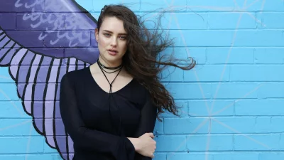 Captivating Young Woman Posing with Windswept Hair and Choker Necklace image