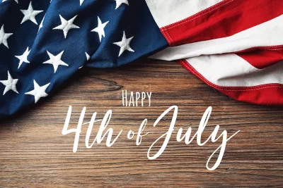 Happy 4th of July Holiday with American Flag on Rustic Wood Background image