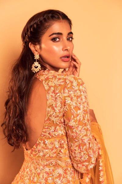 Captivating Pooja Hegde in Ornate Orange Traditional Indian Attire image