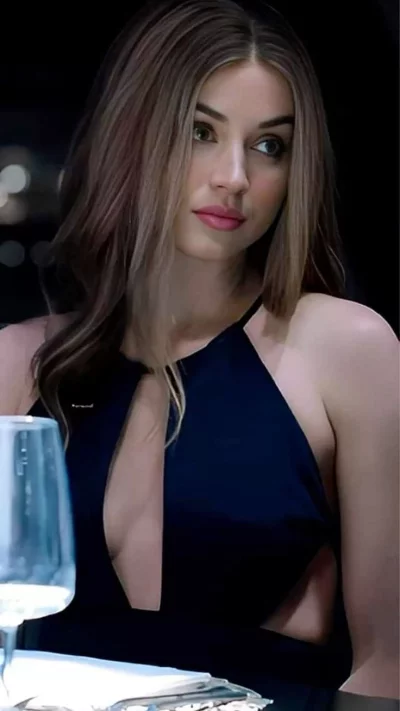 Elegant Woman in a Stylish Dark Blue Dress Enjoying a Sophisticated Evening image