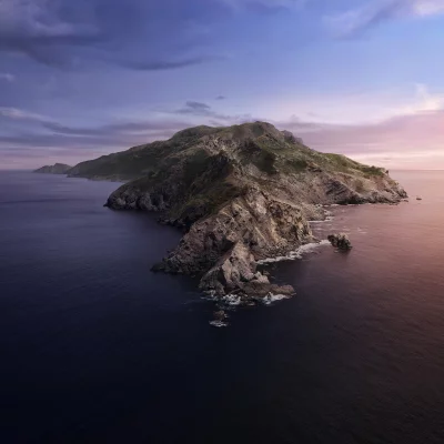 Majestic Island Seascape at Twilight with Dramatic Sky and Reflective Waters image