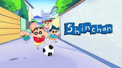 Cartoon Shinchan and friends joyfully playing street football in a vibrant neighborhood image
