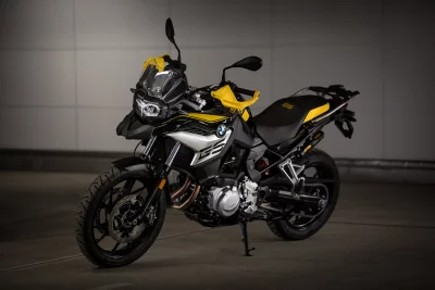 Dynamic BMW F 750 GS Motorcycle Parked in Modern Cinematic Style Wallpaper image