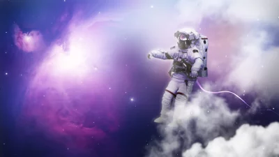 Astronaut Floating Amidst Cosmic Nebula, Sparkling Stars, and Ethereal Clouds image