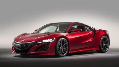 Sleek Red Sports Car Dynamic Design Studio Shot with Modern Aesthetics image