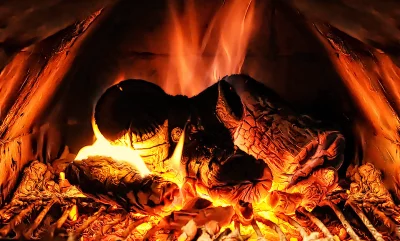 Warm Fireplace with Glowing Logs and Bright Flames Creating Cozy Ambiance image