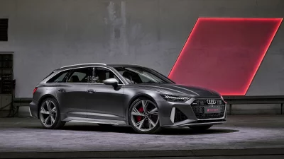 Sleek Dark Grey Audi RS6 Avant Performance Station Wagon in Modern Studio Setting image