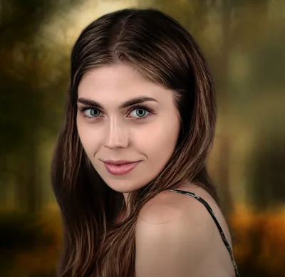 Portrait of a Smiling Woman with Green Eyes and Flowing Brown Hair image