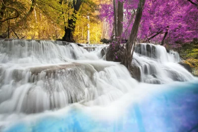 Surreal Waterfall with Pink and Golden Autumn Trees, Long Exposure Nature Scene image