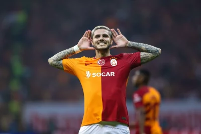 Mauro Icardi Galatasaray Football Player Celebrating Goal with Playful Listening Gesture image