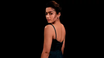 Captivating Rashmika Mandanna Posing Elegantly, Looking Back in Cinematic Style image