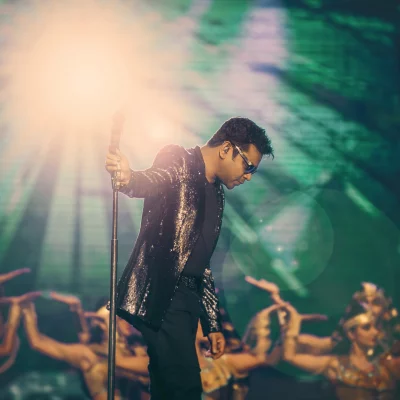 Musical Icon A.R. Rahman Performing Live on Stage with Spotlight image