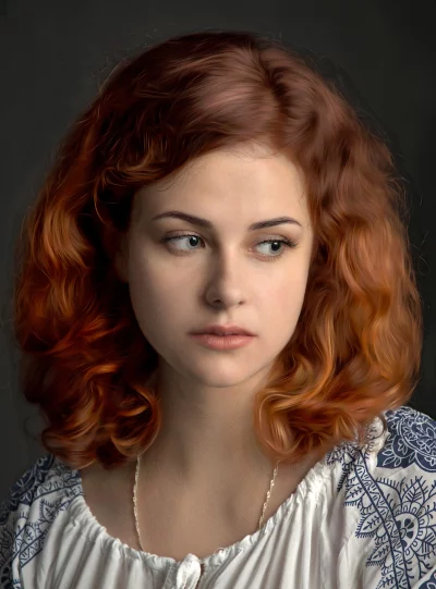 Pensive Young Woman with Reddish Curly Hair and Serene Side Glance image