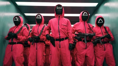 Elite Guard Figures in Red Jumpsuits with Masks and Weapons image