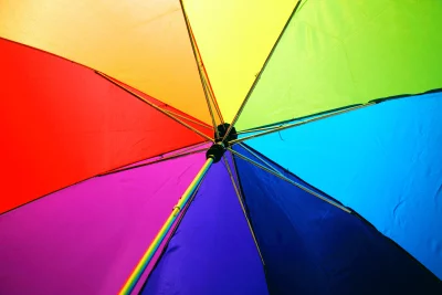Vibrant Rainbow Umbrella Interior with Bright Color Segments image