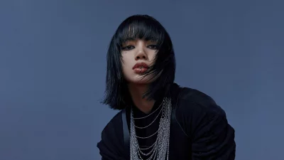 Edgy Young Woman with Black Hair, Lip Ring, and Silver Chain Necklace Portrait image