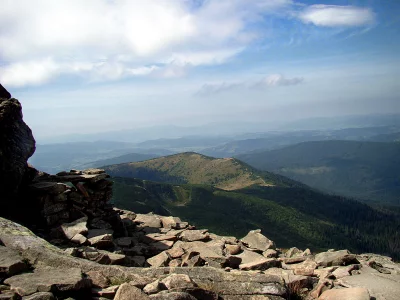 Majestic Mountain View Rocky Summit and Rolling Forest Hills image