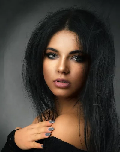 Intense Beauty Portrait of Woman with Dark Hair and Smoky Eyes image