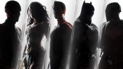 Epic Justice League Superheroes Silhouettes with Glowing Effects and Dramatic Lighting image