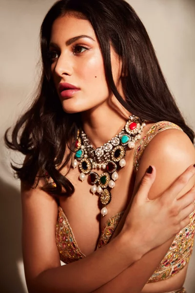 Pensive Woman in Traditional Indian Embellished Attire with Jeweled Necklace image