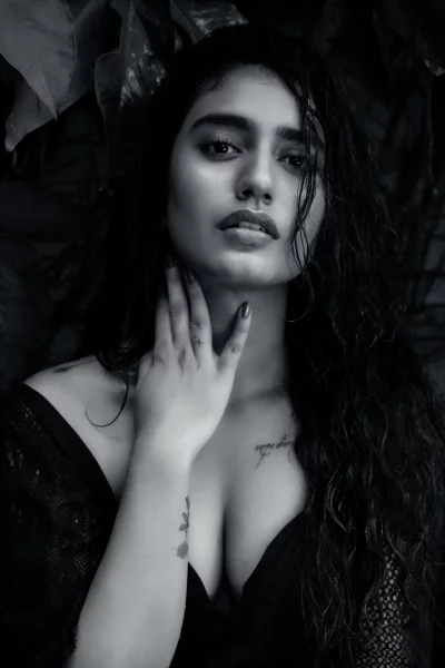 Dramatic Black and White Portrait of Woman with Wet Hair and Pensive Gaze image