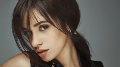 Captivating Camila Cabello Studio Portrait with Intense Gaze and Dark Hair image