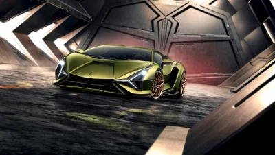 Dynamic view of a luxury green concept car in a dramatic, illuminated environment image