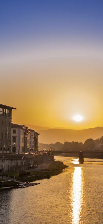 Golden Hour Sunset Over Florence Arno River and Buildings