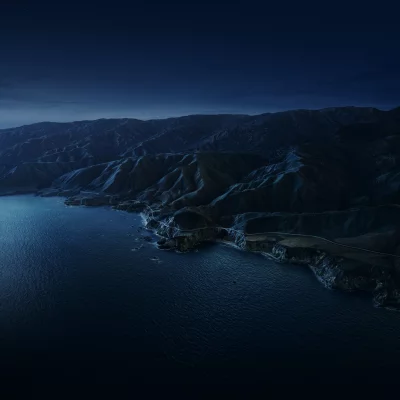 Cinematic Night Coastline with Iconic Bridge and Starry Sky Wallpaper image