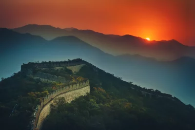 Majestic Great Wall of China Winding Through Mountains at Golden Sunset Scenic Cinematic Wallpaper image
