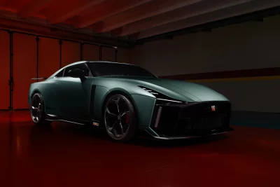 Sleek Dark Green Nissan GT-R50 Supercar in Moody Red-Lit Garage image