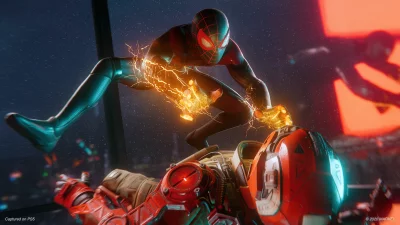 Miles Morales Spider-Man Unleashes Venom Blast on Armored Foe in Dynamic City Combat image