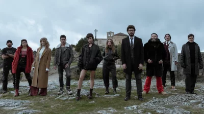 Diverse Ensemble of Characters Posing Confidently Outdoors with Ancient Church Background image