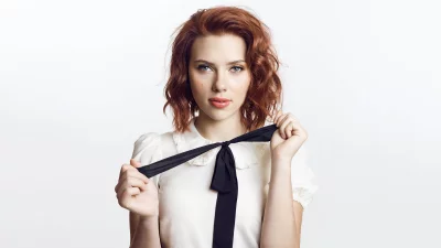 Scarlett Johansson Playfully Adjusting Black Bow in Elegant White Blouse Portrait image