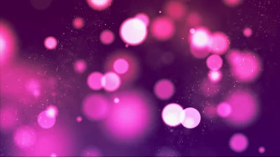 Vibrant Pink and Purple Bokeh Lights Abstract Particle Background image
