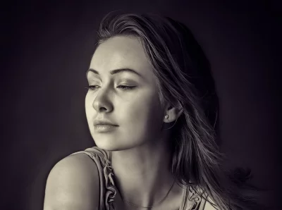 Elegant Monochrome Portrait of Young Woman with Pensive Gaze image