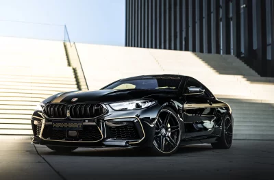 Luxury Black Sports Coupe Gold Accents Manhart Performance Tuning image