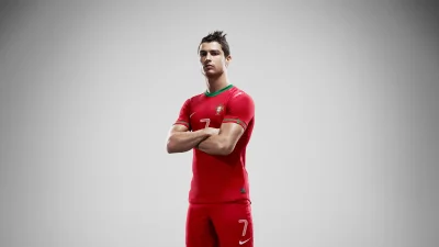 Legendary footballer Cristiano Ronaldo in red Portugal jersey with arms crossed image