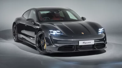 Sleek Dark Grey Porsche Taycan Electric Sports Sedan image