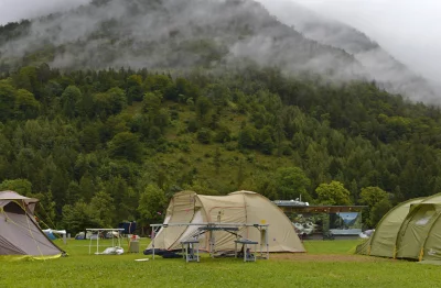 Misty Mountain Campsite with Tents, Outdoor Adventure in Foggy Forest image